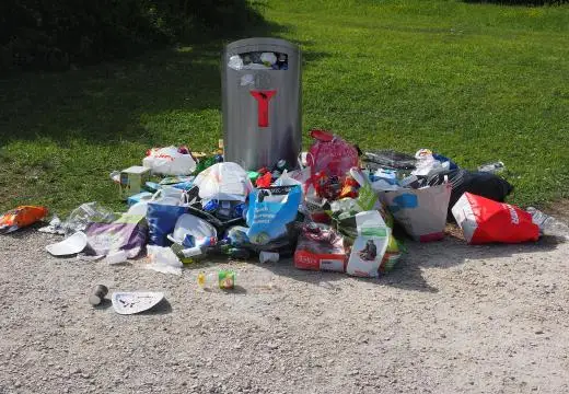 Household waste piled up in a messy area where a standard roadside bin is no longer enough, highlighting the need for cheapest skip bins townsville