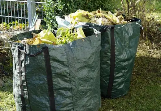 Pile of green waste prepared for collection with skip bins townsville qld service